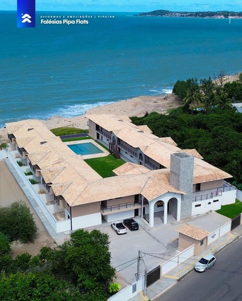 Property building, Facade/entrance, Neighbourhood, Natural landscape, Bird's eye view, Beach, Pool view, Sea view, Swimming pool, Location