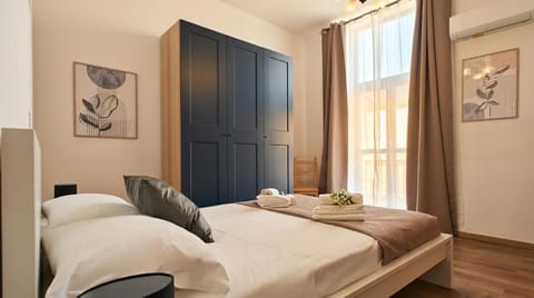 Bed, Photo of the whole room, Bedroom, towels, wardrobe