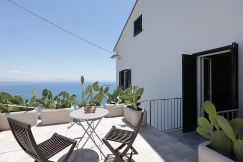 Property building, Patio, Day, Natural landscape, View (from property/room), Balcony/Terrace, Sea view
