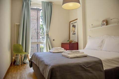 Nearby landmark, Bed, Day, Library, Library, TV and multimedia, Decorative detail, Decorative detail, Bedroom, Landmark view, Landmark view, Time of day, furniture, furniture, hair dryier, heating, heating, internet, internet, towels, towels, wardrobe, air conditioner, air conditioner