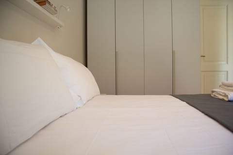 Nearby landmark, Bed, Day, Library, Library, TV and multimedia, Decorative detail, Decorative detail, Bedroom, Landmark view, Landmark view, Time of day, furniture, furniture, hair dryier, heating, heating, internet, internet, towels, towels, wardrobe, air conditioner, air conditioner