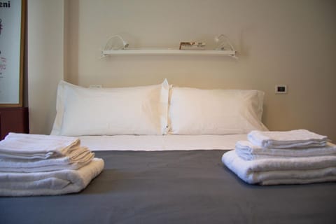 Nearby landmark, Bed, Day, Library, Library, TV and multimedia, Decorative detail, Decorative detail, Bedroom, Landmark view, Landmark view, Time of day, furniture, furniture, hair dryier, heating, heating, internet, internet, towels, towels, wardrobe, air conditioner, air conditioner