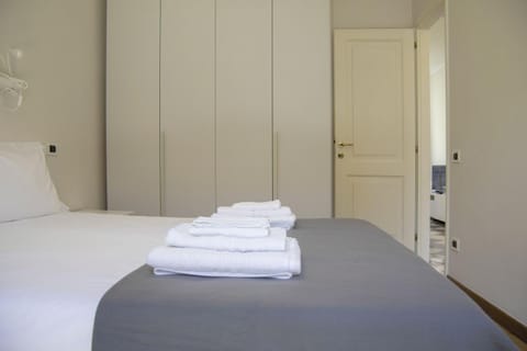 Nearby landmark, Bed, Day, Library, Library, TV and multimedia, Decorative detail, Decorative detail, Bedroom, Landmark view, Landmark view, Time of day, furniture, furniture, hair dryier, heating, heating, internet, internet, towels, towels, wardrobe, air conditioner, air conditioner