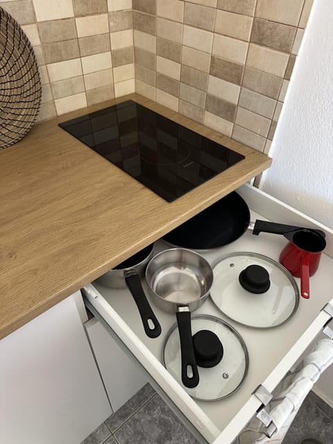 Kitchen or kitchenette, stove