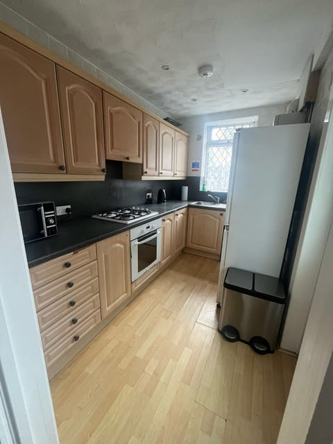 Kitchen or kitchenette, oven, stove