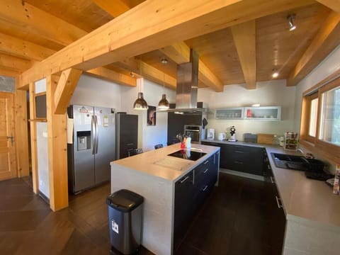 Kitchen or kitchenette, dishwasher, oven, stove