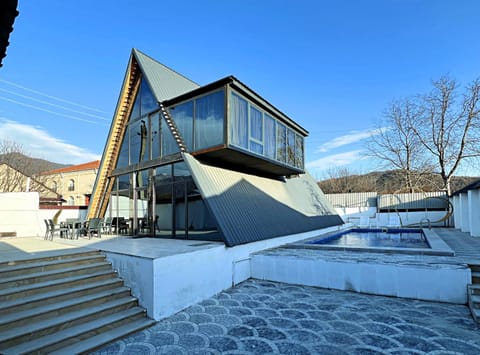 Property building, Day, Natural landscape, Pool view, Swimming pool