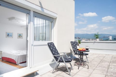 Property building, Facade/entrance, View (from property/room), Balcony/Terrace, City view, City view, Mountain view, Mountain view, Street view