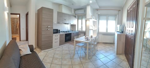 Kitchen or kitchenette, oven, stove