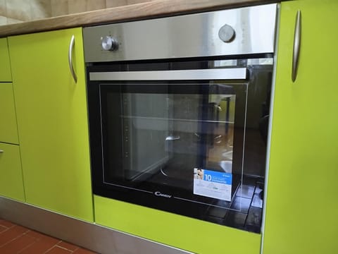 Kitchen or kitchenette, oven