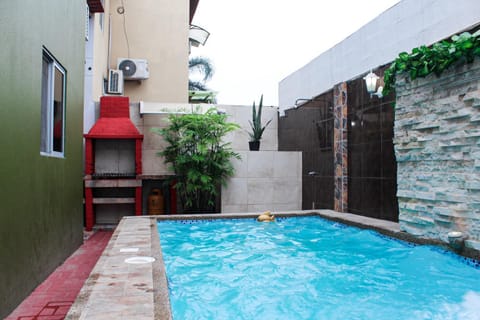 Property building, Patio, Day, Pool view, Swimming pool