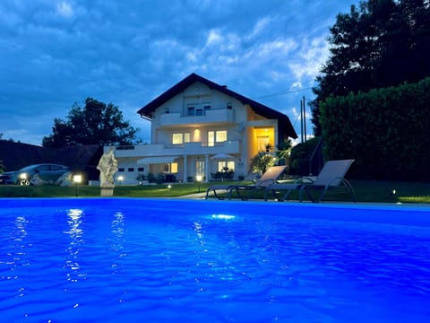 Property building, Night, Swimming pool