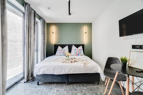 Bed, TV and multimedia, Living room, Bedroom