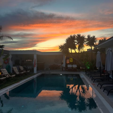Day, Natural landscape, Pool view, Swimming pool, Sunset, sunbed