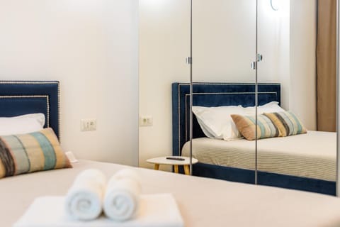 Bed, Photo of the whole room, Bedroom, towels, wardrobe