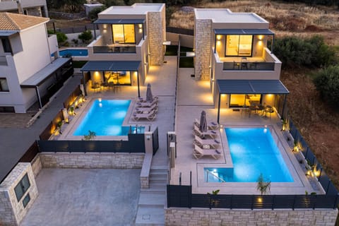 Property building, Patio, Night, Pool view, Swimming pool, sunbed