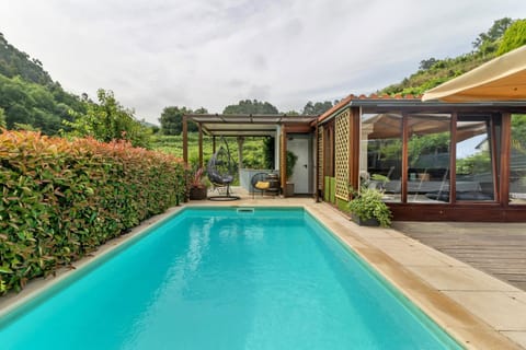 Property building, Living room, Swimming pool