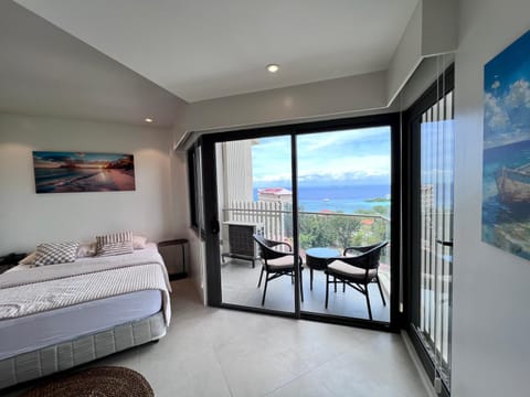 Bed, Natural landscape, View (from property/room), Balcony/Terrace, Seating area, Sea view
