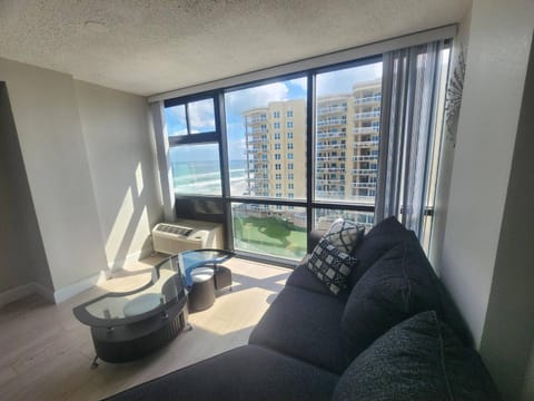View (from property/room), Living room, Pool view, Sea view, Swimming pool
