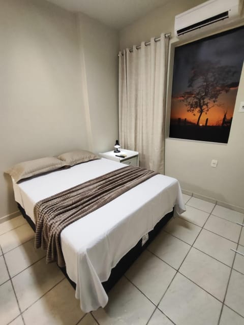 Bed, air conditioner