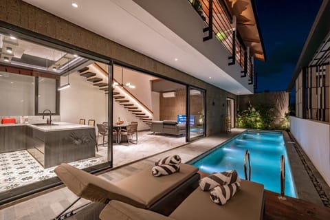 Patio, Night, View (from property/room), Living room, Seating area, Pool view, Swimming pool, sunbed