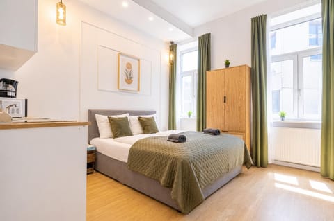Bed, Kitchen or kitchenette, Bedroom, towels, wardrobe
