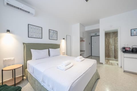 Bed, Photo of the whole room, Bedroom, towels, air conditioner