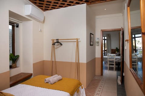 Bed, Photo of the whole room, Bedroom, towels, air conditioner