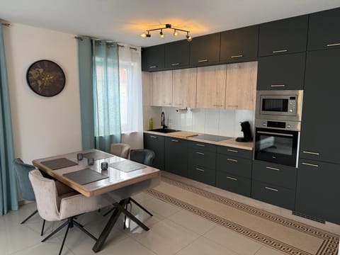 Dining area, oven, stove, toaster, kitchen
