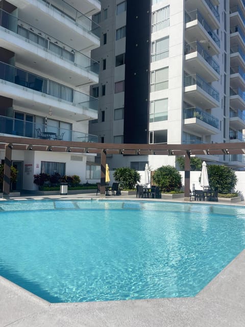 Property building, Patio, Day, Pool view, Swimming pool, sunbed