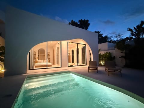 Property building, Patio, Night, Pool view, Swimming pool, sunbed