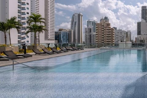 Property building, Day, Pool view, Swimming pool, Swimming pool, sunbed