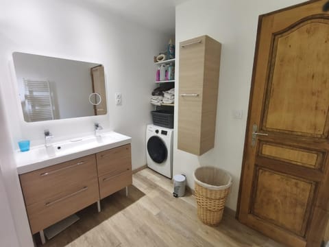 Bathroom, towels, wardrobe, washing machine, dryer