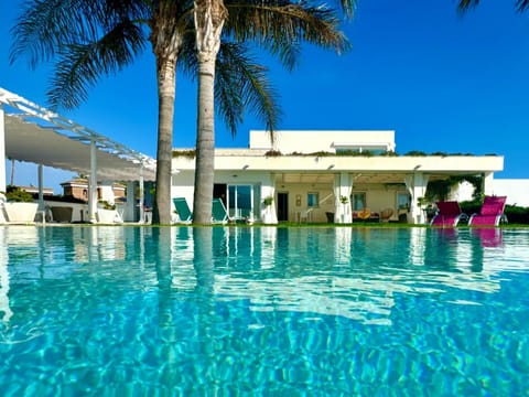 Property building, Living room, Swimming pool