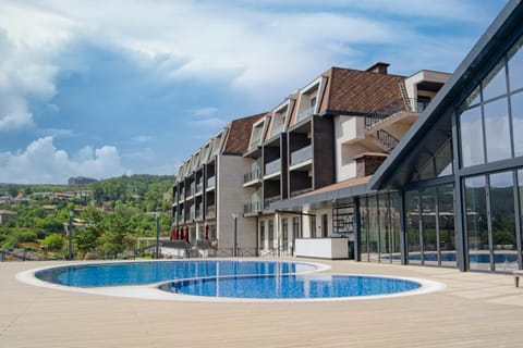 Property building, Natural landscape, Pool view, Swimming pool