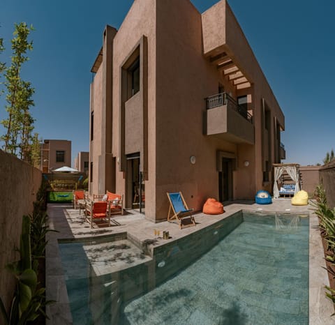 Shower, Property building, Patio, Day, View (from property/room), Balcony/Terrace, Pool view, Swimming pool, sunbed