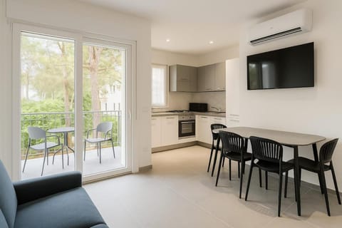 Garden apartment with parking Apartment in Lignano Sabbiadoro