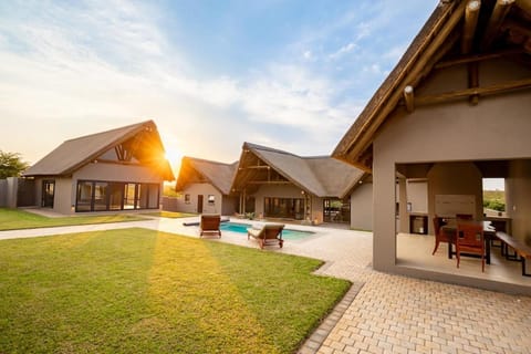 Property building, Patio, Day, Garden, Garden view, Pool view, Swimming pool, sunbed