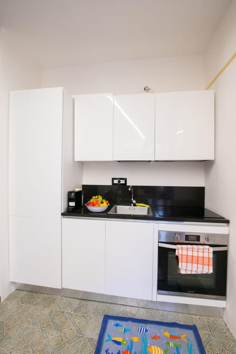 Kitchen or kitchenette, oven, stove
