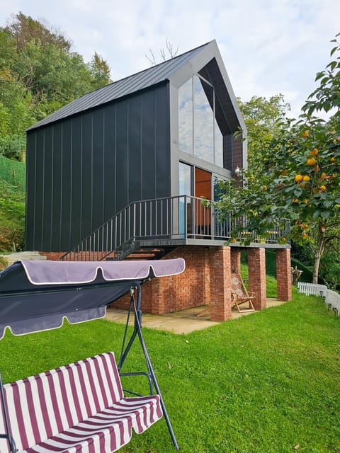 Property building, Patio, Natural landscape, Garden, sunbed