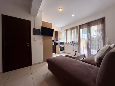 TV and multimedia, Kitchen or kitchenette, Living room, Seating area, stove
