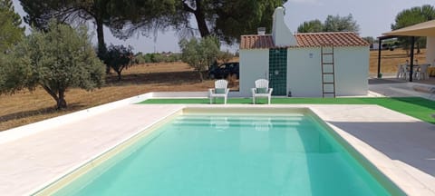Property building, Living room, Swimming pool