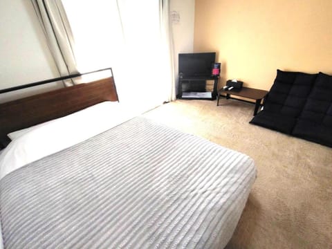 Bed, Seating area, Bedroom