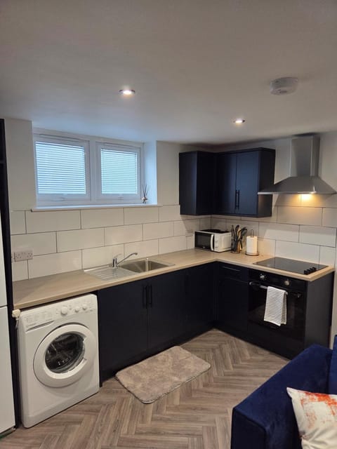 Kitchen or kitchenette, washing machine