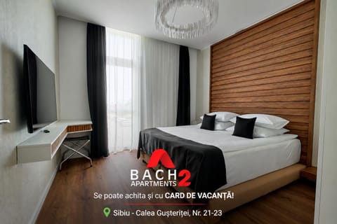 Bed, Property logo or sign, Bedroom