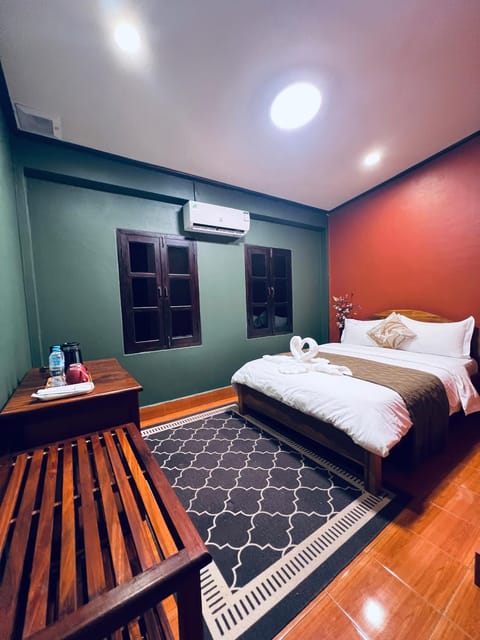 Bed, Photo of the whole room, Bedroom, towels, air conditioner