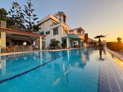 Property building, Pool view, Swimming pool, sunbed