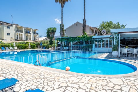 Property building, Living room, Swimming pool