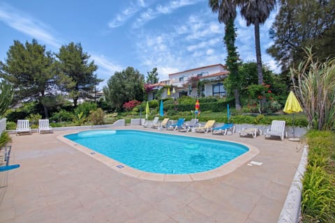 Property building, Living room, Swimming pool