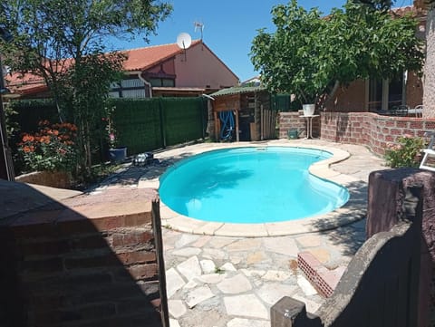 Property building, Living room, Swimming pool